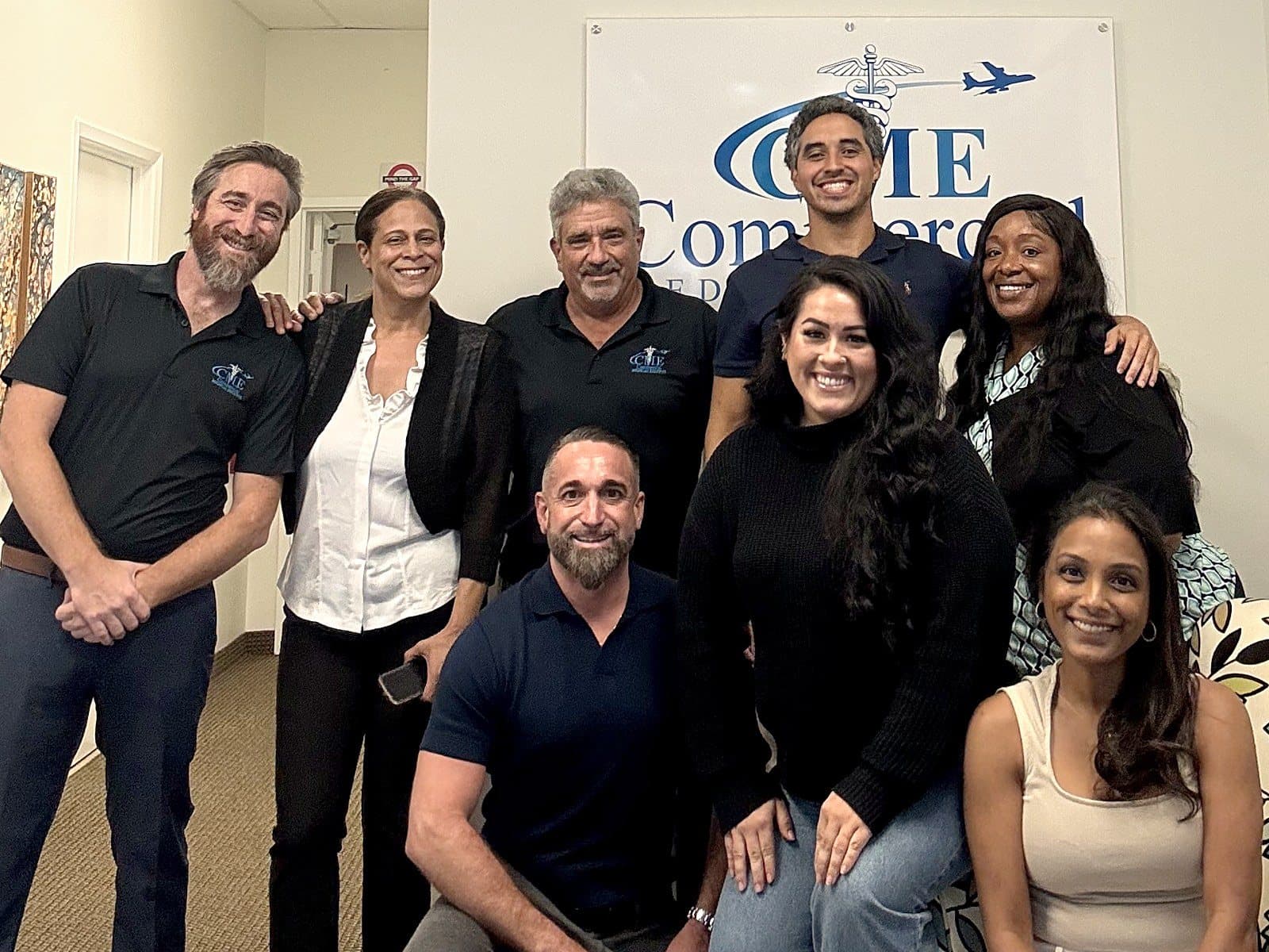 The Commercial Medical Escorts team together at the Pompano Beach office